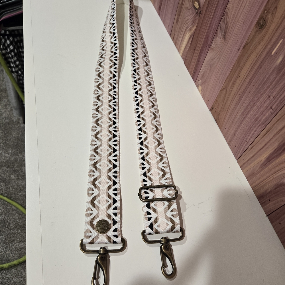 Geometric Patterned Strap W/ Antique Brass Ends.